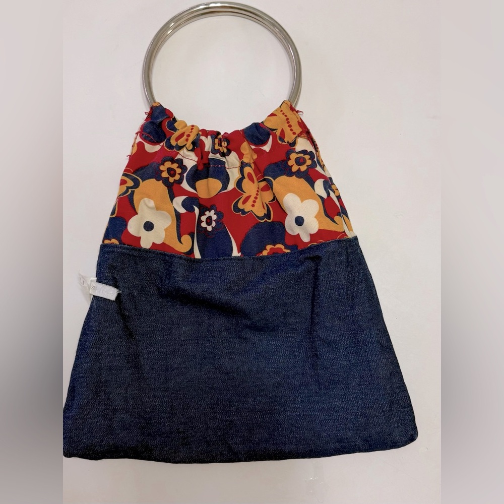 Denim and flower hand bag/purse with silver tone ring handles